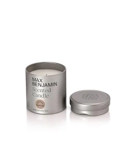 candle in packaging tin with label 
